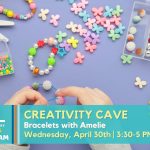 Promotional image for bracelet making with Amelie at the Library. Depicts a close-up image of two hands stringing beads onto a thin cord.