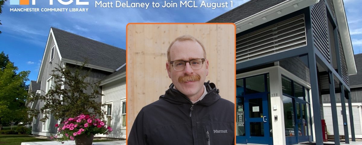 Portrait of a white man with reddish hair and a thick mustache placed in front of the Manchester Community Library. Text reads "Executive Director News: Matt DeLaney to join MCL August 1" with the Manchester Community Library logo in the upper left.